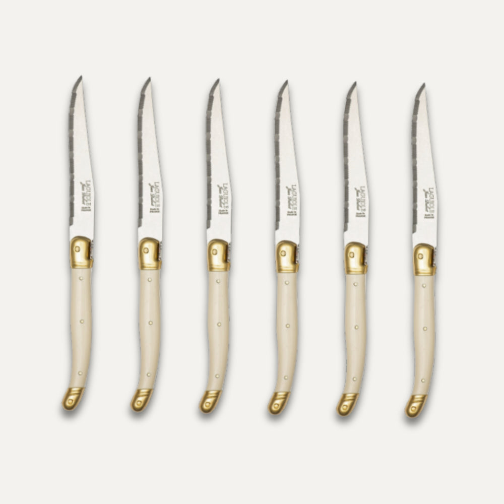 Coffret de 6 couteaux Laguiole dentelés – Manche ivoire et laiton
