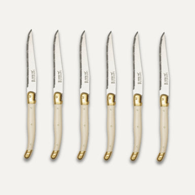 Coffret de 6 couteaux Laguiole dentelés – Manche ivoire et laiton