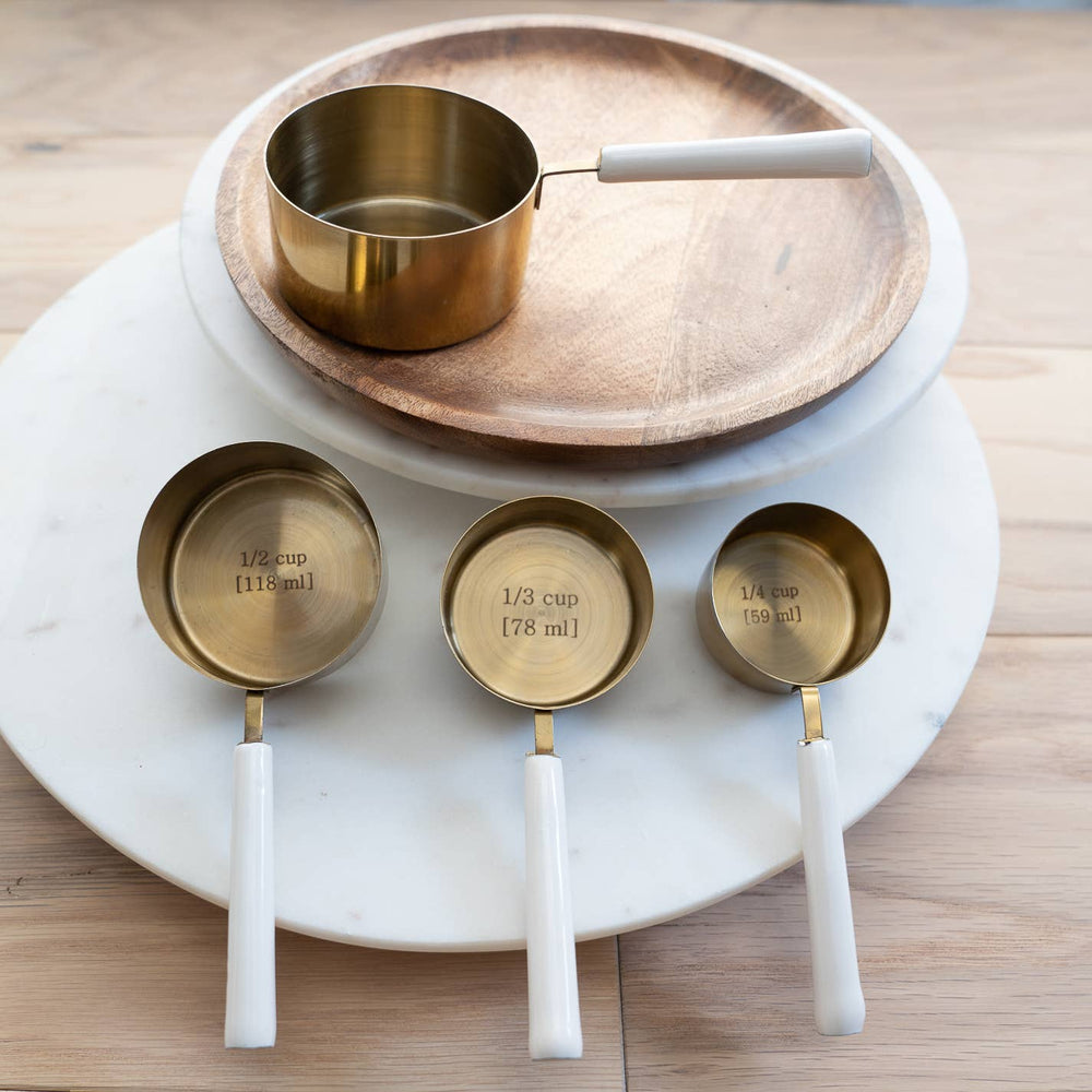 Gold measuring cups - with white enamel handle