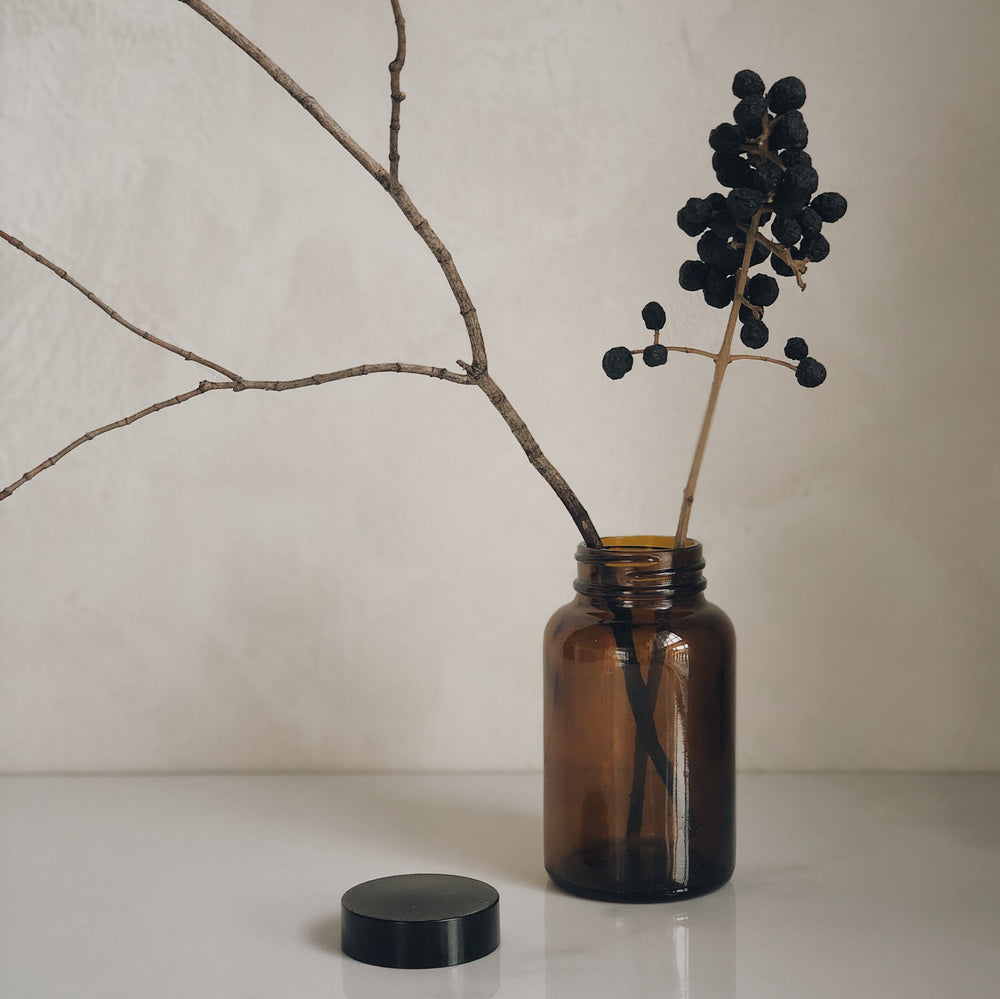 Petite bouteille ambrée vintage