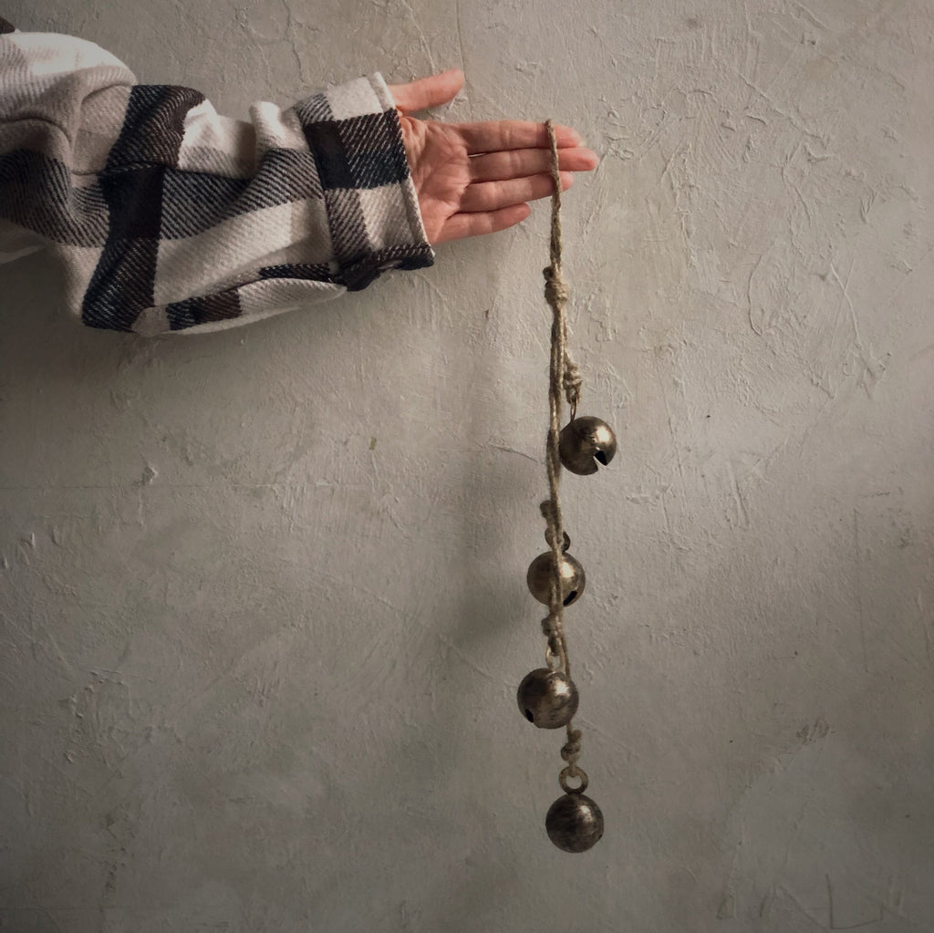Hanging bells in antique brass 